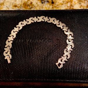 Silver “X” and “+” bracelet